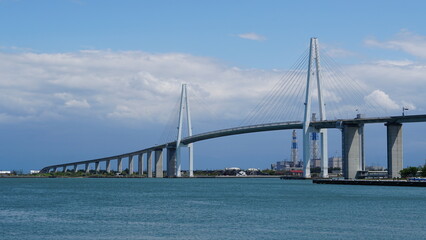 Toyama Port under Blue Skies: Bridges and Sails over the Japan Sea
