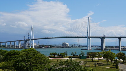 Toyama Port under Blue Skies: Bridges and Sails over the Japan Sea