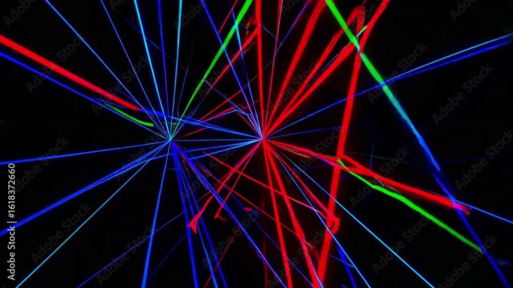 Poster dynamic, colorful laser light beams converge in a mesmerizing display. the radiant lines create a ca