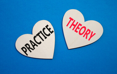 Theory or Practice symbol. Concept word Theory or Practice on wooden hearts. Beautiful blue...