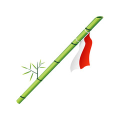 Green bamboo spears decorated with the red and white Indonesian independence flag