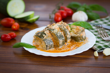 Baked zucchini with cheese and sesame in a creamy sauce