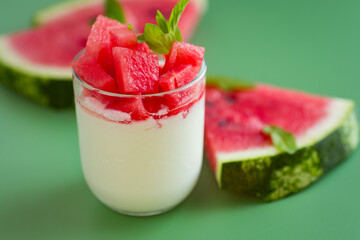 Bright watermelon pieces with morning yogurt