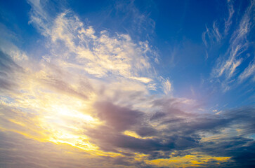 Evening sunset behind the clouds
