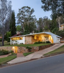 Obraz premium Modern home nestled in a hillside landscape at twilight