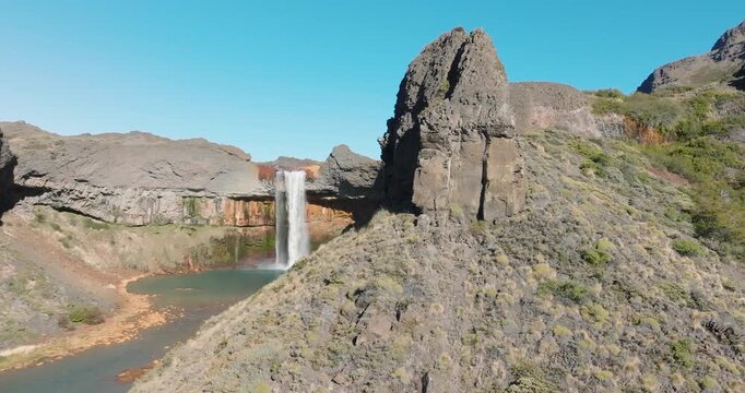 Aerial panorama view of Salto del Agrio waterfall on a beautiful sunny day. Neuquen, Patagonia, Argentina
