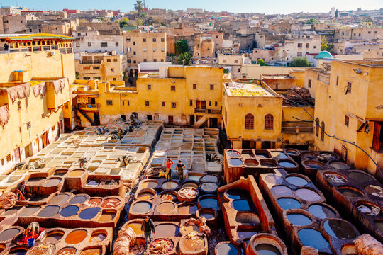 Fez, Morocco: Workers dye leather in traditional tanneries, a centuries-old process, amid the city's ancient medina..