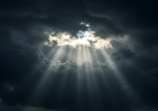 Dramatic sun rays piercing through a dark, stormy sky, symbolizing hope, spirituality, and a breakthrough of light in challenging times.