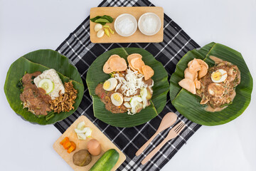 Healthy Fresh Cuisine Indonesian Mixed Vegetables - Gado-Gado, Lotek & Pecel with Rich Peanut Dressing & Crispy Mushroom. Isolated in White Background