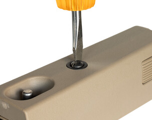 Brown plastic forend on a rifle stock being installed