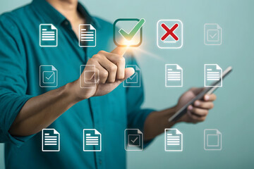 Person touching a digital screen with checkmarks and document icons checking approval