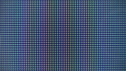 Close-up macro shot of an LCD screen showing individual pixels and RGB subpixels, a digital background.