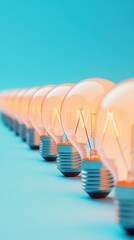 Glowing light bulbs in a row on a bright blue background