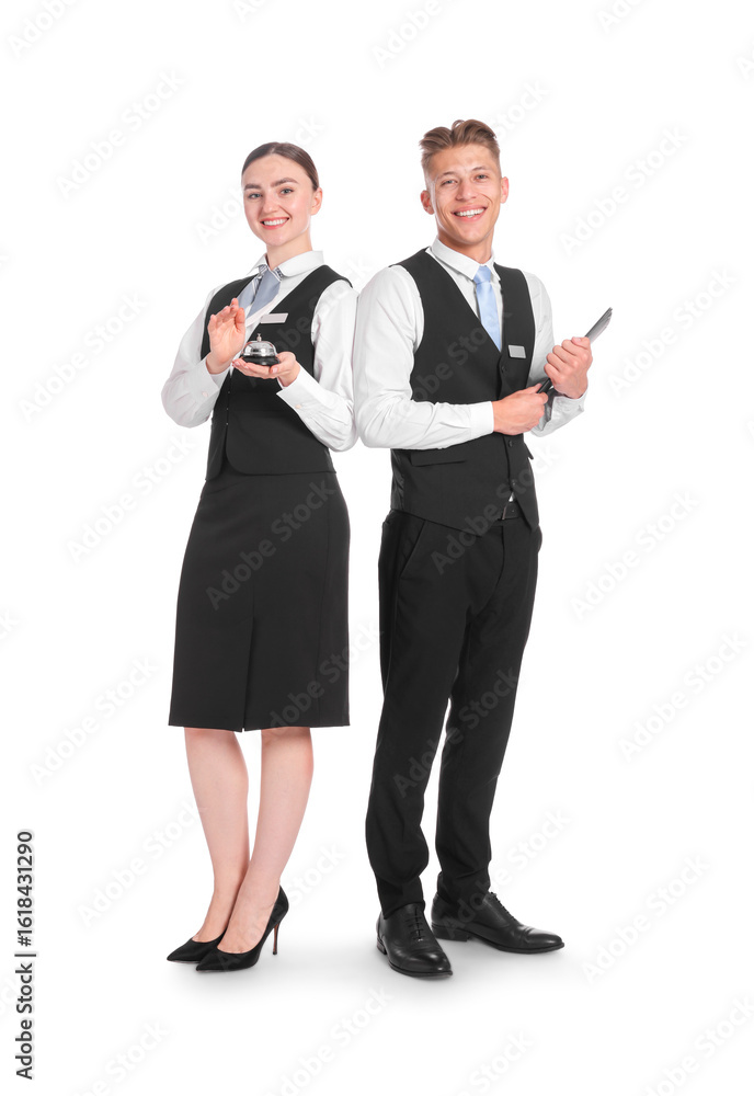 Poster smiling receptionists in uniforms with service bell and clipboard on white background