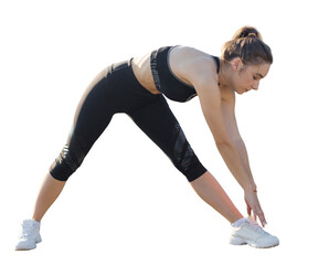 A young slim athletic girl in sportswear performs a set of exercises.