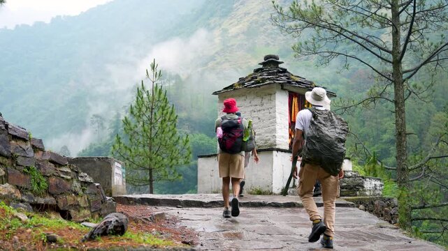 A beautiful view of Madhyamaheshwar Temple, a Hindu shrine dedicated to Lord Shiva, located in Gaundar village in the Rudraprayag district, nestled amidst the Garhwal Himalayas of Uttarakhand, India.