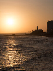 Salvador Bahia Brazil. Lighthouse Barra silhouette at golden sunset