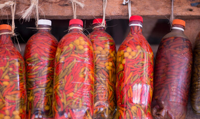 Canned peppers in bottles for sale at the fair