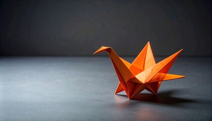 Orange Origami Crane On Gray Background