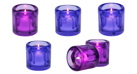 Lit purple and blue votive candles arranged on white casting warm glow suitable for spa decor relaxation
