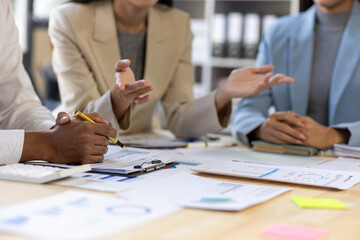 Businesswoman discussing marketing strategy during corporate meeting in office.