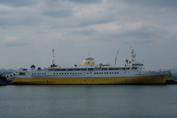 Historic passenger car roro ro-ro ferry cruiseship cruise ship liner Hakkoda Maru in Aomori, Japan with city skyline