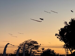 Kites on the sunset sky in Sanur beach, Bali, Indonesia