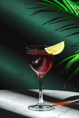 Irish Jack Rose alcoholic cocktail drink with Irish whiskey, calvados, lime juice, grenadine and lime slice
