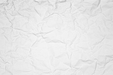 Crumpled paper texture background. White wrinkled or creased paper sheet. Abstract grunge vintage surface for design, overlay or wallpaper.
