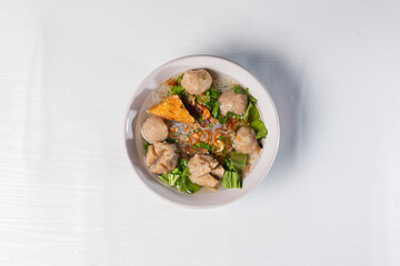 Indonesian Local Cuisine Mie Bakso - Noodles with Meat ball & Rich Beef Broth. Isolated in White Background
