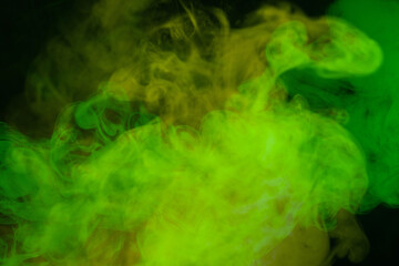Yellow steam on a black background.