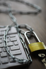 Secure Computer Keyboard with Chain and Padlock Symbolizing Cybersecurity and Data Protection