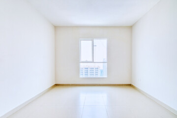 Clean unfurnished apartment interior showcasing spacious layout, raw architectural details, and...