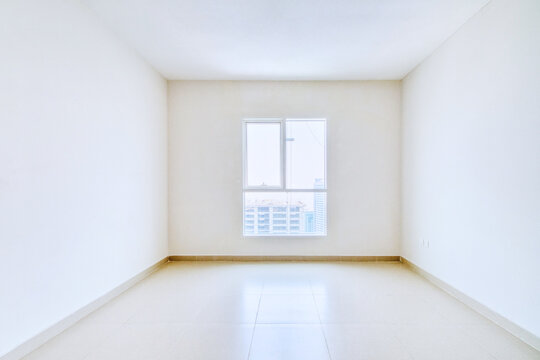 Clean unfurnished apartment interior showcasing spacious layout, raw architectural details, and abundant natural light. Ideal for real estate listings. Series.