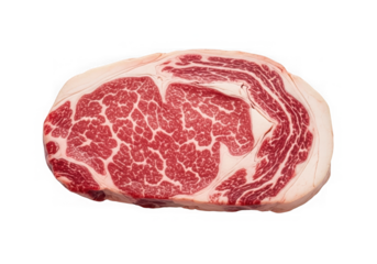 A raw ribeye steak with marbling sits isolated on transparent background