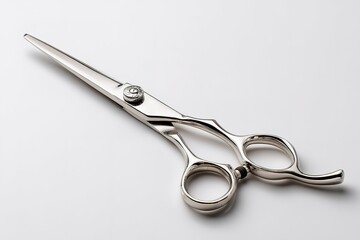 Fototapeta premium High-quality professional scissors resting on a smooth surface showcasing their elegant design and sharp blades for precise cutting