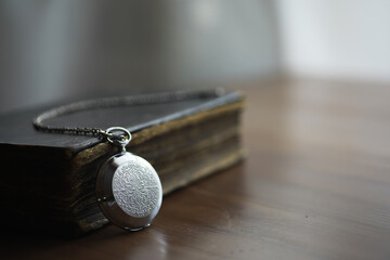 Vintage Pocket Watch on Antique Book - Time, History, Nostalgia, Antique, Vintage