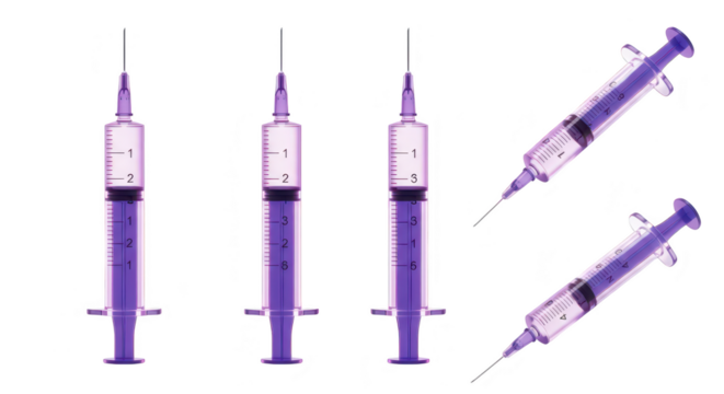 Multiple syringes filled with liquid arranged against a white background showing potential use in medical and scientific applications