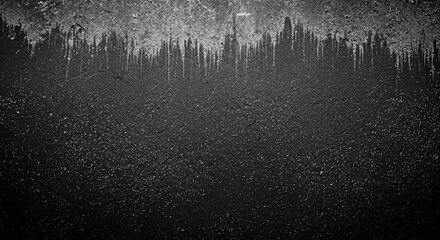 Striking dark textured grunge wall background with dramatic drips for edgy designs and industrial concepts