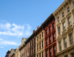 Fototapeta premium Colorful Red Brick City Street - Older Urban Residential Buildings