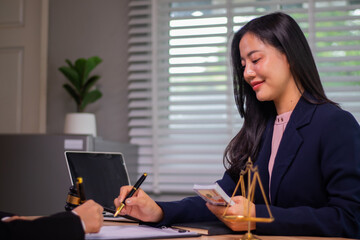 In the company's law office, a businessman secretly hands over dollar bills with contracts,...