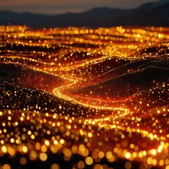 Fototapeta premium Golden city lights winding through hills at night