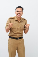 Annoyed young indonesian civil servant man standing with angry expression and gesture