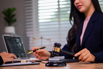 In the company's law office, a businessman secretly hands over dollar bills with contracts,...