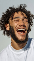 Authentic Joyful Mid‑Laughter Headshot on Off‑White Background for Happiness Ads