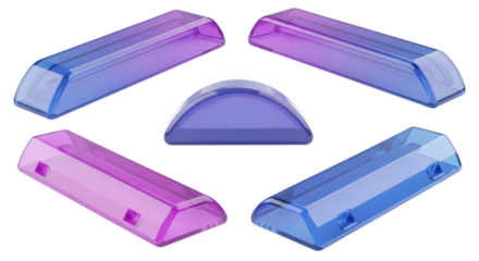 Transparent colorful geometric plastic components are arranged creatively against a plain white backdrop showcasing product design for potential use in manufacturing or art