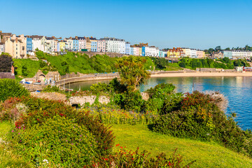 A view from the Castle Hill towards the North Beach in the early morning in Tenby, South Wales in...