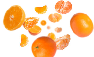 Juicy tangerines swirling in air against white background