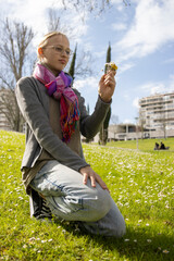 Young person enjoying nature in urban park setting