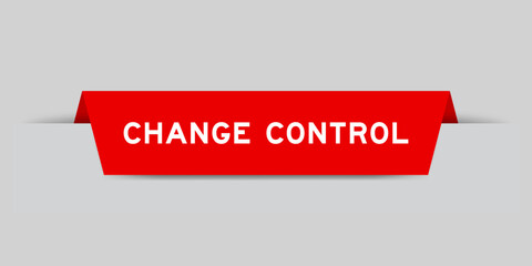 Red color inserted label with word change control on gray background